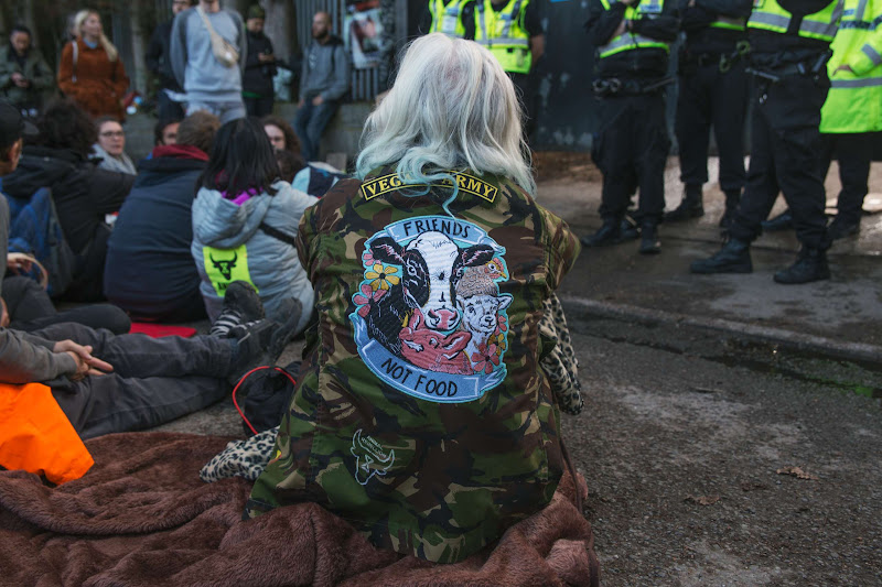 Activist Wearing A Friends Not Food Jacket
