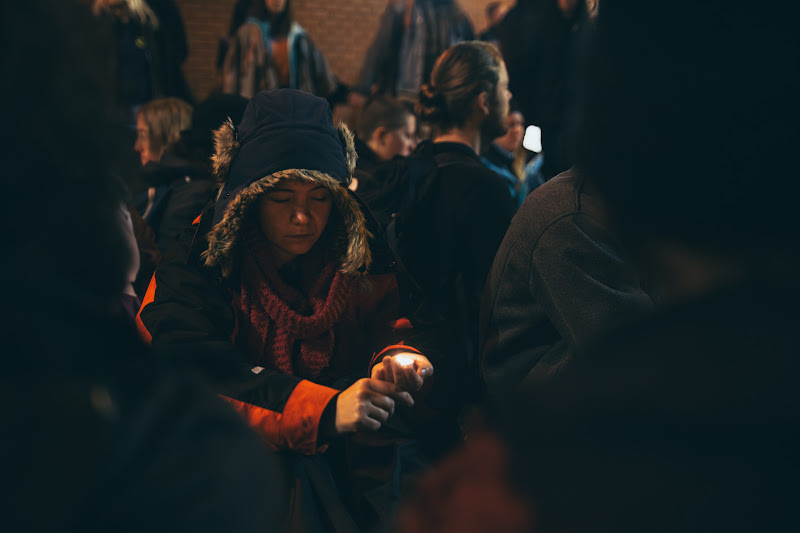 Activist Holding A Candle At Fish Market Protest
